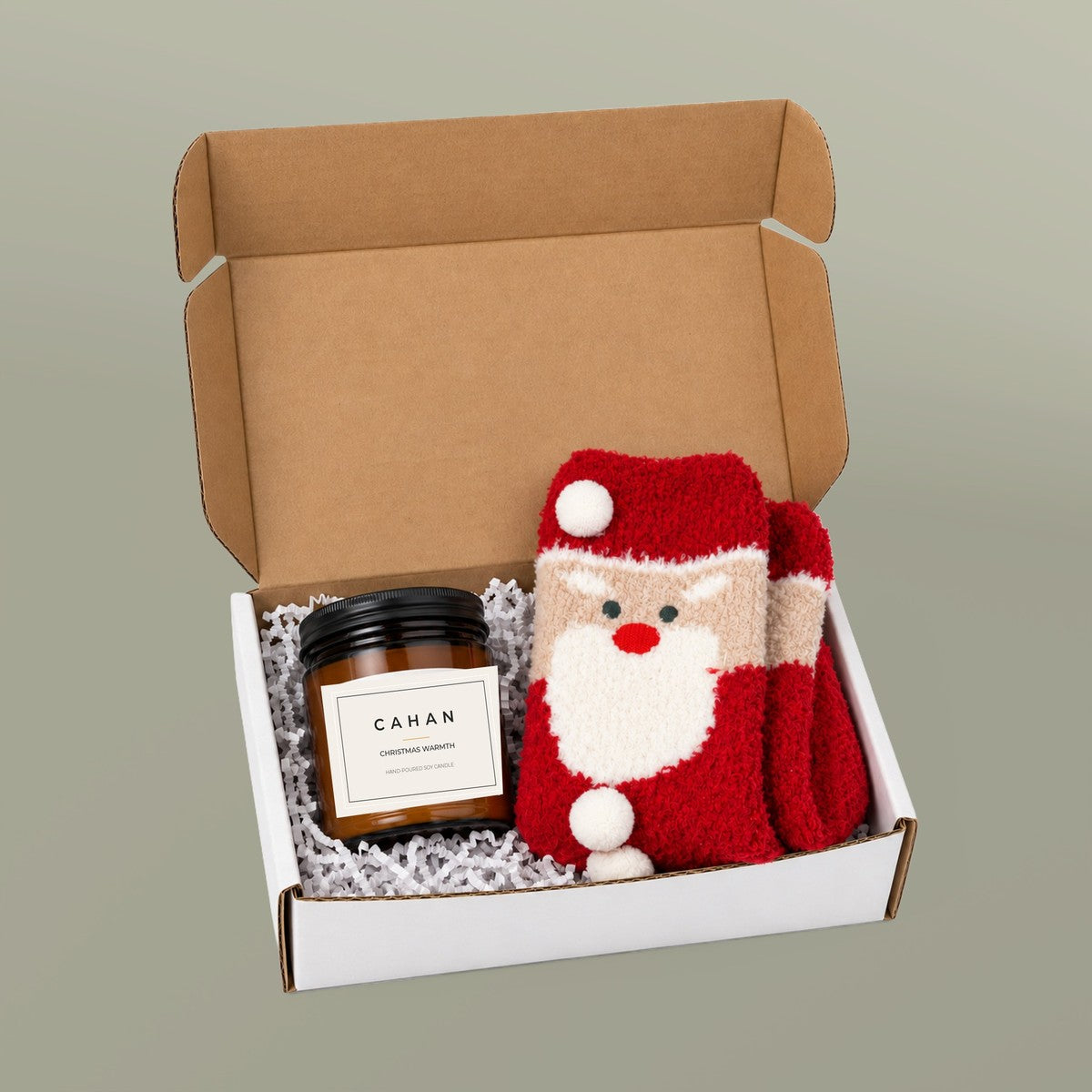 CAHAN Christmas Cozy gift box with amber soy candle and fluffy Santa socks