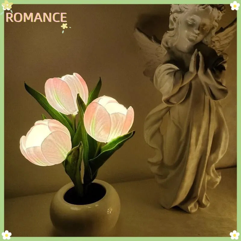 Pink tulip LED lamp glowing at night