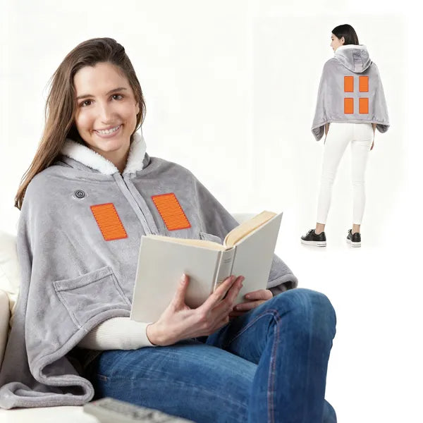 Reading on the couch in the heated hooded blanket