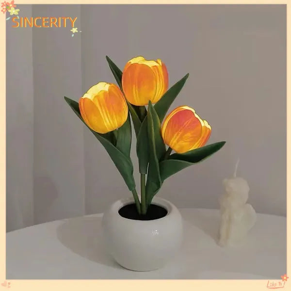 Orange tulip LED lamp in a white pot